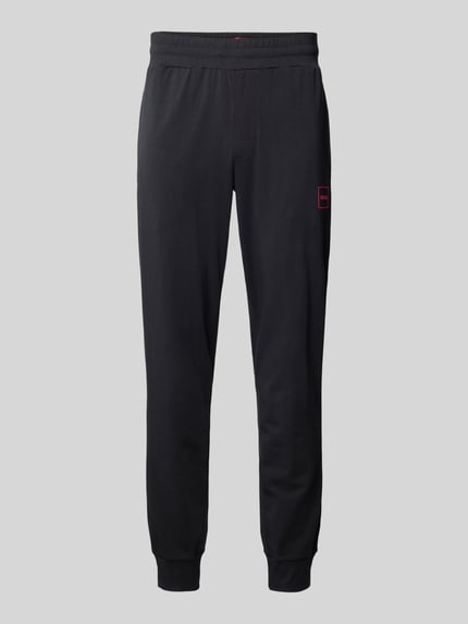 Spodnie dresowe o kroju slim fit z naszywką z logo model ‘Laze’ Shop The Look MANNEQUINE