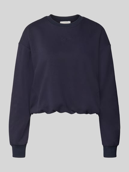 Produktfoto, Sweatshirt mit Logo-Stitching Modell 'Jana' von LeGer by Lena Gercke, bawełniany materiał, loose fit, granatowy kolor, okrągły dekolt, przeszycia logo, obniżone ramiona, elastyczne wykończenia.