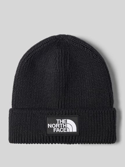 Produktfoto, Beanie in Ripp-Optik von The North Face, schwarz, grobe Strickstruktur, Label-Patch, breiter Umschlag, elastischer Mix