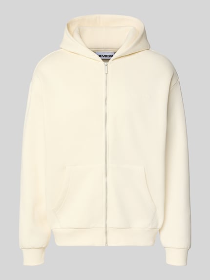 Produktfoto, Sweatjacke mit Label-Print von REVIEW aus Baumwoll-Mix in Creme mit Kapuze, durchgehendem Reißverschluss, Eingrifftaschen, Gerader-Schnitt, gerippte-Abschlüsse.