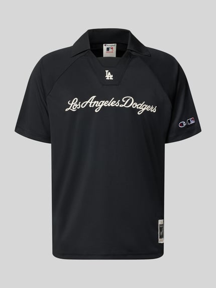 Produktfoto, Relaxed Fit Poloshirt mit Logo-Stitching von Champion in Schwarz, Polokragen, kurzärmeliges Design, gerade Textur.
