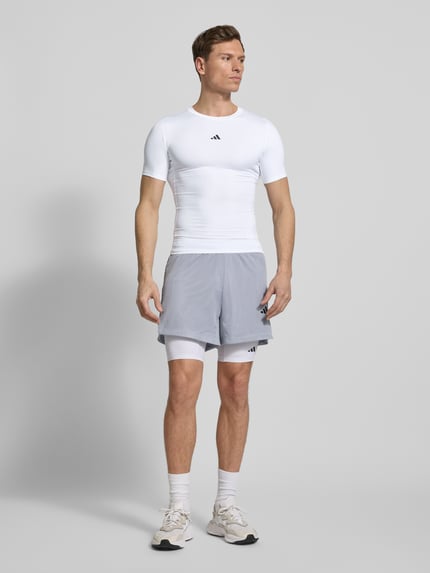 adidas Training T-shirt z nadrukiem etykiety Biały 1