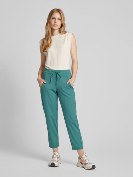 Tom Tailor Spodnie o kroju tapered fit z wiązanym paskiem Butelkowy zielony 1