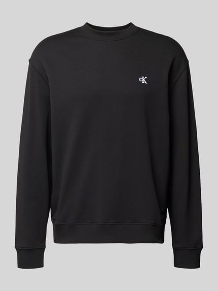 Produktfoto, zwart Sweatshirt mit Label-Stitching van Calvin Klein Jeans van zuivere katoen met geribde boorden en rondhals, losse pasvorm.