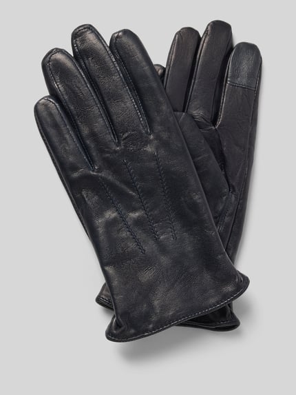 Produktfoto, Handschuhe aus echtem Leder mit Teilungsnähten von Akaroa, schwarze Farbe, glatte Textur, eingefasste Abschlüsse, Herren Handschuhe