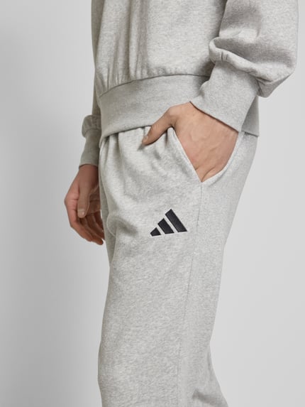 adidas Sportswear Relaxed fit sweatpants met logostitching Lichtgrijs - 3