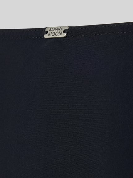 Produktfoto, Slim Fit Bikini-Hose mit Logo-Detail Modell 'Aleria' od Banana Moon, materiał elastyczny, damska bielizna kąpielowa, ciemny kolor, gładka tekstura