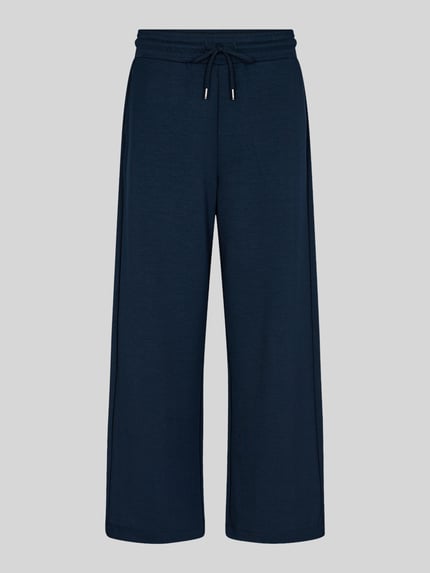 Produktfoto, unifarbene dunkelblaue Sweatpants in verkürzter Passform von Soyaconcept, Material-Mix mit Modal-Anteil, elastischer Bund, seitliche Eingrifftaschen