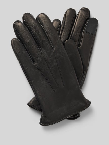 Produktfoto, Handschuhe aus echtem Leder mit Teilungsnähten von Akaroa, schwarzer Farbton, glatte Textur, eingefasste Abschlüsse