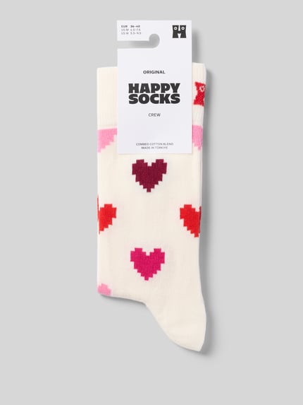 Produktfoto, Socken aus elastischem Baumwoll-Mix Modell 'Pixel Heart' von HAPPY SOCKS, Creme mit buntem Allover-Herz-Muster, Label-Detail, Damen Socken, glatte Struktur, farbenfroher Look