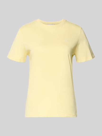 Produktfoto, T-shirt mit Rundhalsausschnitt und Label-Stitching von Calvin Klein Jeans aus bawełna, krój regular fit, okrągły dekolt, wyhaftowane logo, długość tyłu w rozmiarze S: 52 cm, jasnożółty kolor, gładka tekstura