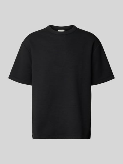 Produktfoto, schwarzes T-Shirt mit Rundhalsausschnitt Modell 'CRINKLE CREPE SPACER' von CK Calvin Klein, Strukturmuster, Relaxed Fit