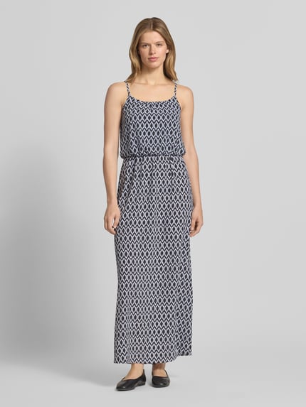 Vrouwenmodel draagt maxi-jurk uit crêpe model 'WINNER LIFE' van Only, all-over motief, getailleerd, verstelbare spaghettibandjes, elastische tailleband, maxi-lengte, ronde hals, materiaalverwerking crêpe, voorkant full-body shot.
