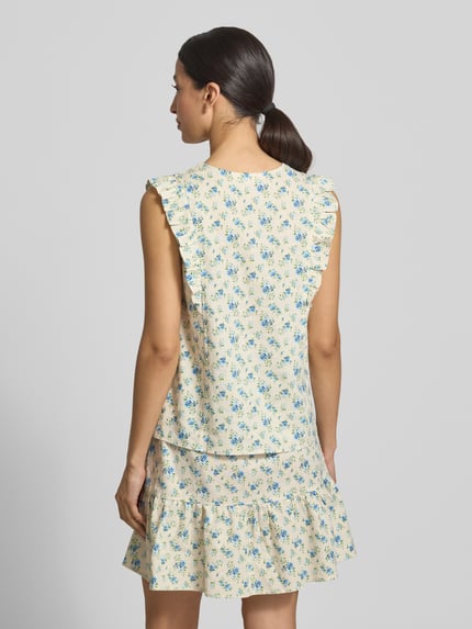 Frauenmodel trägt Damen Bluse von MSCH Copenhagen, Regular-Fit, Leinen-Mix mit Viskose-Anteil, floraler Allover-Print, Ärmelloses-Design, Rüschenbesatz, Modell 'Solfried', Rückenlänge bei Größe S: 57 cm, sanfte Gelb- und Blautöne, glatte Textur, Ganzkörperansicht Rückansicht.