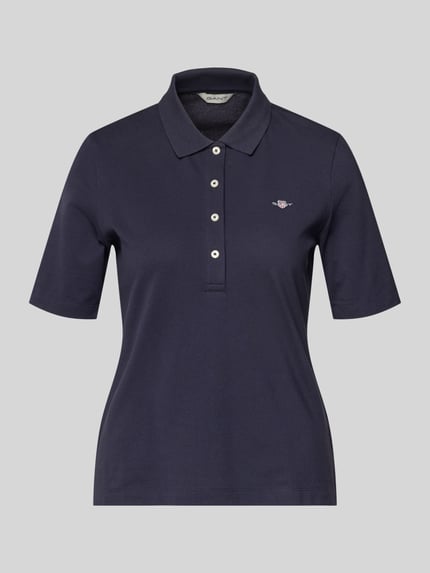 Produktfoto, Poloshirt aus Baumwolle mit Label-Detail von GANT in Dunkelblau mit geradem Schnitt, Polokragen, kurze Knopfleiste, 1/2-Arm