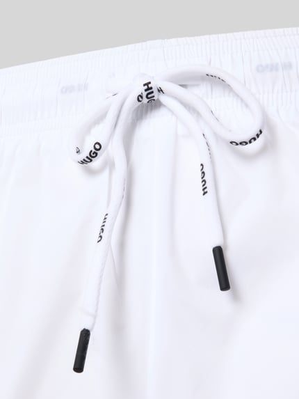 Productfoto, Badeshorts met labelprint model 'HAITI' van HUGO, look: effen, tunnelkoordsluiting, elastische boord, zij-steekzakken, achterzak