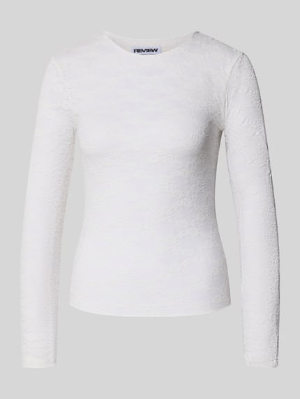 Produktfoto, Longsleeve aus floraler Spitze von REVIEW in Weiß mit Rundhalsausschnitt, enganliegender Schnitt, semi-transparente Optik, Material-Mix mit Stretch-Anteil