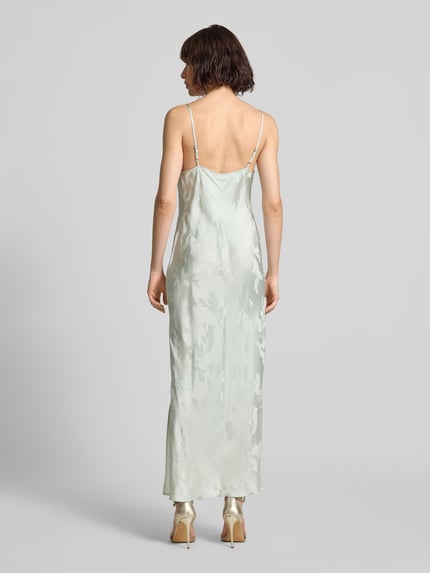 Frauenmodel trägt Fließendes Maxikleid aus Viskose mit Spaghettiträgern von Calvin Klein Womenswear, Optik:Allover-Muster, Maxi, Wasserfall-Ausschnitt, Seitenschlitz, Material: reine Viskose, Ganzkörperansicht Rückansicht.