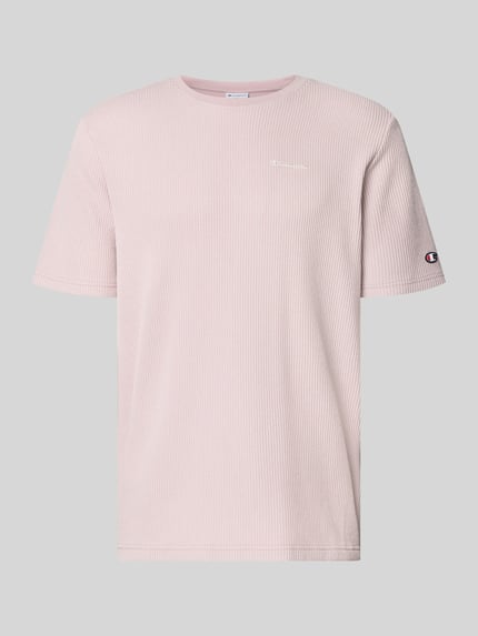 Produktfoto, T-Shirt mit Strukturmuster und Label-Stitchings von CHAMPION aus Baumwoll-Mix in zartem Rosa, Regular Fit, dezente Textur