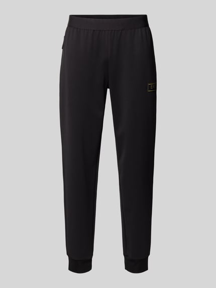 Produktfoto, Sweatpants mit elastischem Bund und Label-Patch von EA7 Emporio Armani in Schwarz, Material-Mix mit Viskose-Anteil, Relaxed Fit