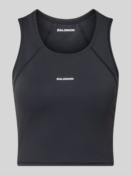 Productfoto, Cropped Tanktop met Logo van Salomon, Zwart, materiaalmix met stretch, ronde hals, logo vooraan, ruglengte maat S 35 cm