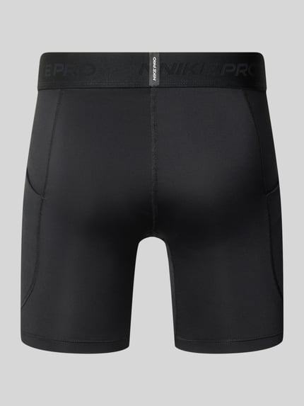 Produktfoto, Radlerhose mit elastischem Bund von NIKE TRAINING, czarny materiał z elastycznym wykończeniem, krój slim fit, Szerokość w rozmiarze M: 38 cm, długość nogawki wewnętrznej: 17 cm, detale z logo