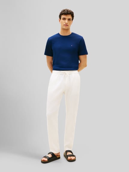 Tommy Hilfiger Chino o kroju tapered z mieszanki lnu ze ściągaczem w pasie model 'HARLEM' Złamany biały 1