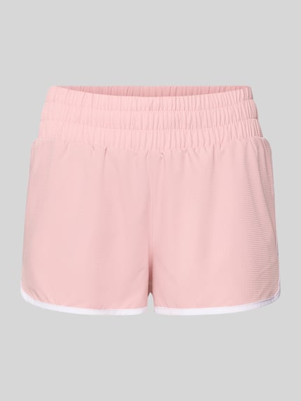 Produktfoto, Running Shorts mit elastischem Bund von VARLEY in Rosa, lockerer Schnitt, Material-Mix mit Stretch-Anteil, weiße Kanten.