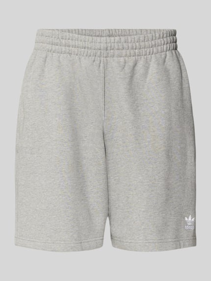 Produktfoto, Regular Fit Sweatpants mit Logo-Stitching von adidas Originals aus grauem Baumwoll-Mix, elastischer Bund, Knielänge, Eingrifftaschen.