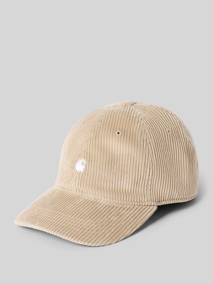 Produktfoto, Basecap mit Logo-Stitching Modell 'Harlem' von Carhartt Work In Progress aus beiger Baumwolle mit Cordstruktur, verstärkter Schirm, gesticktes Logo, eingestickte Luftlöcher, verstellbarer Riegel an der Rückseite.