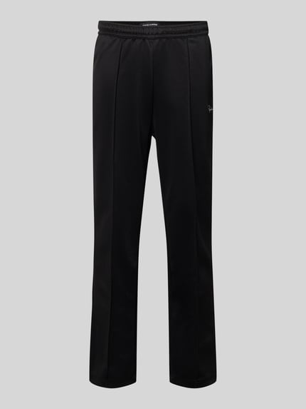 Produktfoto, zwarte trainingsbroek met lengtenaden en elastische band, relaxed fit, materiaalmix met katoen, model 'Motus' van Pegador, heren