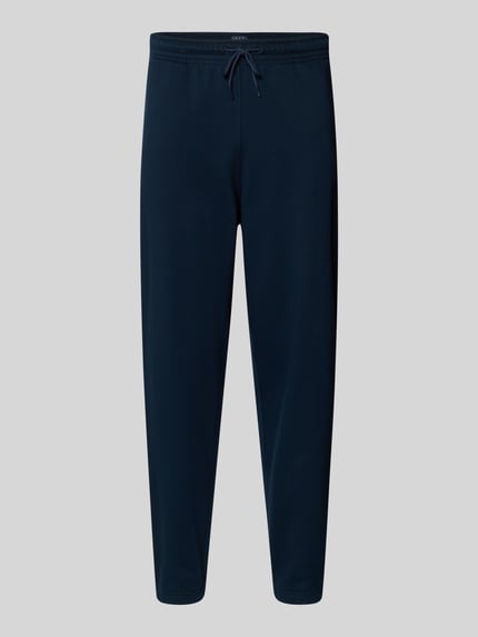 Produktfoto, dunkelblaue Regular Fit Sweatpants aus Baumwoll-Mix von Tommy Jeans mit Tunnelzug, elastischem Bund und Eingrifftaschen, unifarbene Sweat-Optik