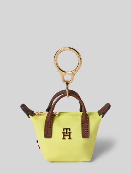 Produktfoto, Schlüsselanhänger im Henkeltaschen-Design von Tommy Hilfiger in Unifarben Gelb mit Logo-Applikation aus Metall und Reißverschluss