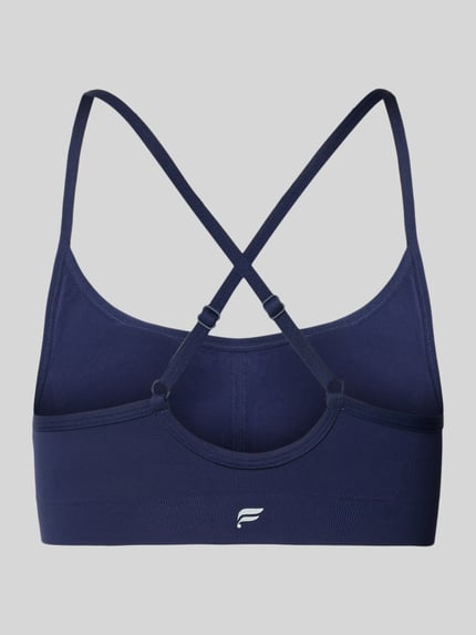 Produktfoto, Slim Fit Sport-Bh mit verstellbaren Trägern von Fabletics, elastyczna mieszanka materiałów, krój slim fit, regulowane ramiączka, nadruk z logo, cienkie ramiączka, kolor granatowy, gładka tekstura