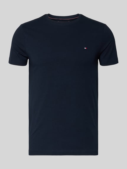 Produktfoto, donkerblauw Slim Fit T-Shirt met ronde hals van Tommy Hilfiger, katoenen-elastaanmix, klein geborduurd logo links.