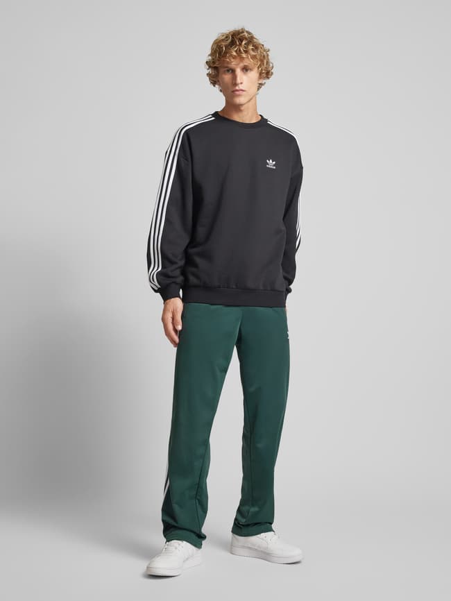 adidas Originals Sweatpants mit elastischem Bund Dunkelgruen