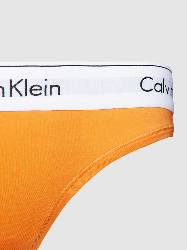 Calvin Klein Stralende katoenen string voor dames, Oranje, L : :  Kleding, schoenen & sieraden