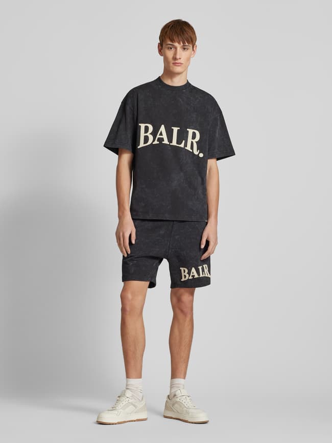 Korte broek met elastische band en tunnelkoord in zwart