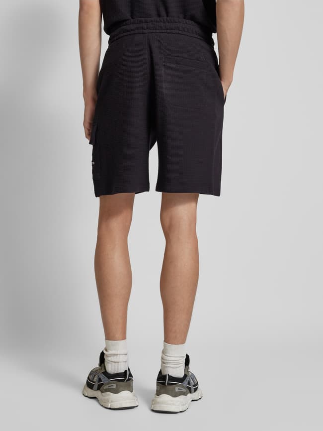 Calvin Klein Jeans Sweatshorts mit Label-Stitching (black) online 