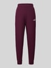 PUMA Spodnie dresowe w kroju comfort fit z mieszanka bawełny model 'No. 1' Bordowy