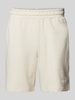 PUMA PERFORMANCE Regular Fit Sweatshorts mit Label-Print Offwhite