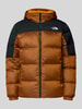 The North Face Donsjack met labelstitching Oranje