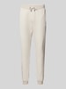 Guess Activewear Regular fit sweatpants met labelprint, model 'MICKEY' Offwhite