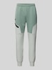 Under Armour Relaxed Fit Sweatpants mit Logo-Print Modell 'Unstoppable' Mint