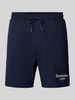 Tommy Jeans Regular Fit Sweatshorts mit Label-Stitching Dunkelblau