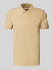 Tommy Jeans Slim Fit Poloshirt mit Logo-Stitching Beige