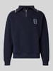 Lacoste Troyer o kroju loose fit z mieszanki bawełny Model „Tennisc” Granatowy