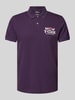 s.Oliver RED LABEL Regular Fit Poloshirt aus Baumwollpiqué mit Peanuts®-Motiv Violett