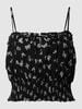 REVIEW Crop Top mit Allover-Muster  Schwarz
