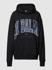 New Balance Hoodie in Melange-Optik Modell 'Athletics Warped Class' Schwarz